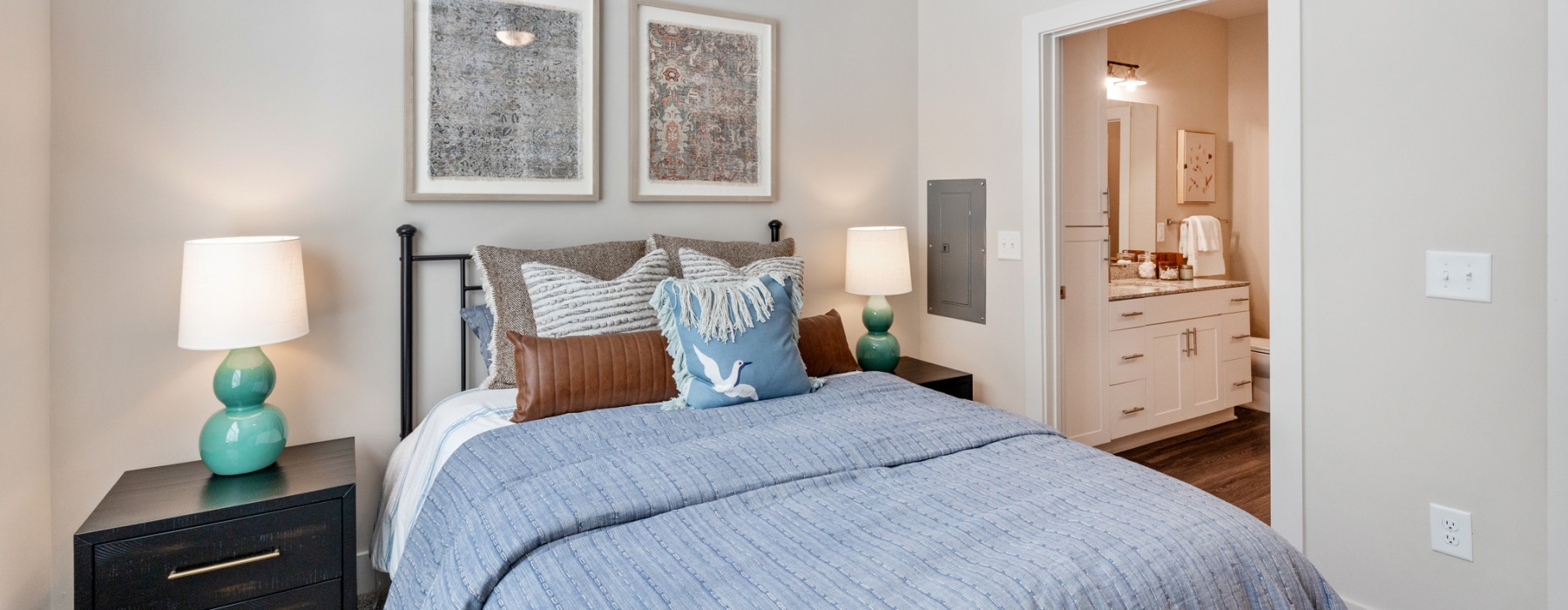 bed with end table and lamp