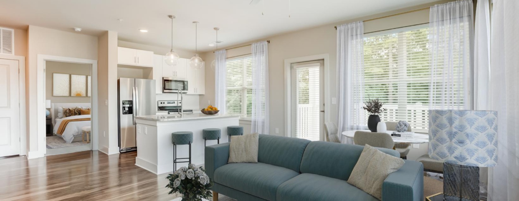 a living room with a blue couch