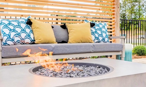 a couch with a fire pit